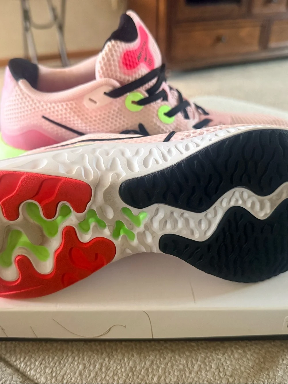 Nike Pink Mesh Running Shoe with Neon Green and Black Details